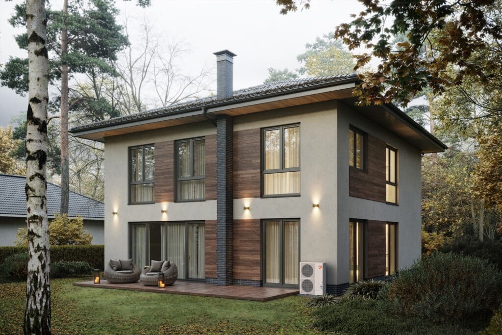 Exterior view of a modern house with a heat pump installed