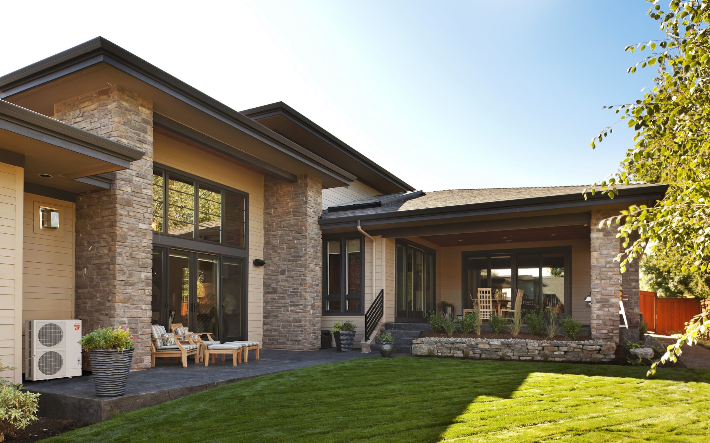 Nice house with a beautiful green lawn on a sunny summer day