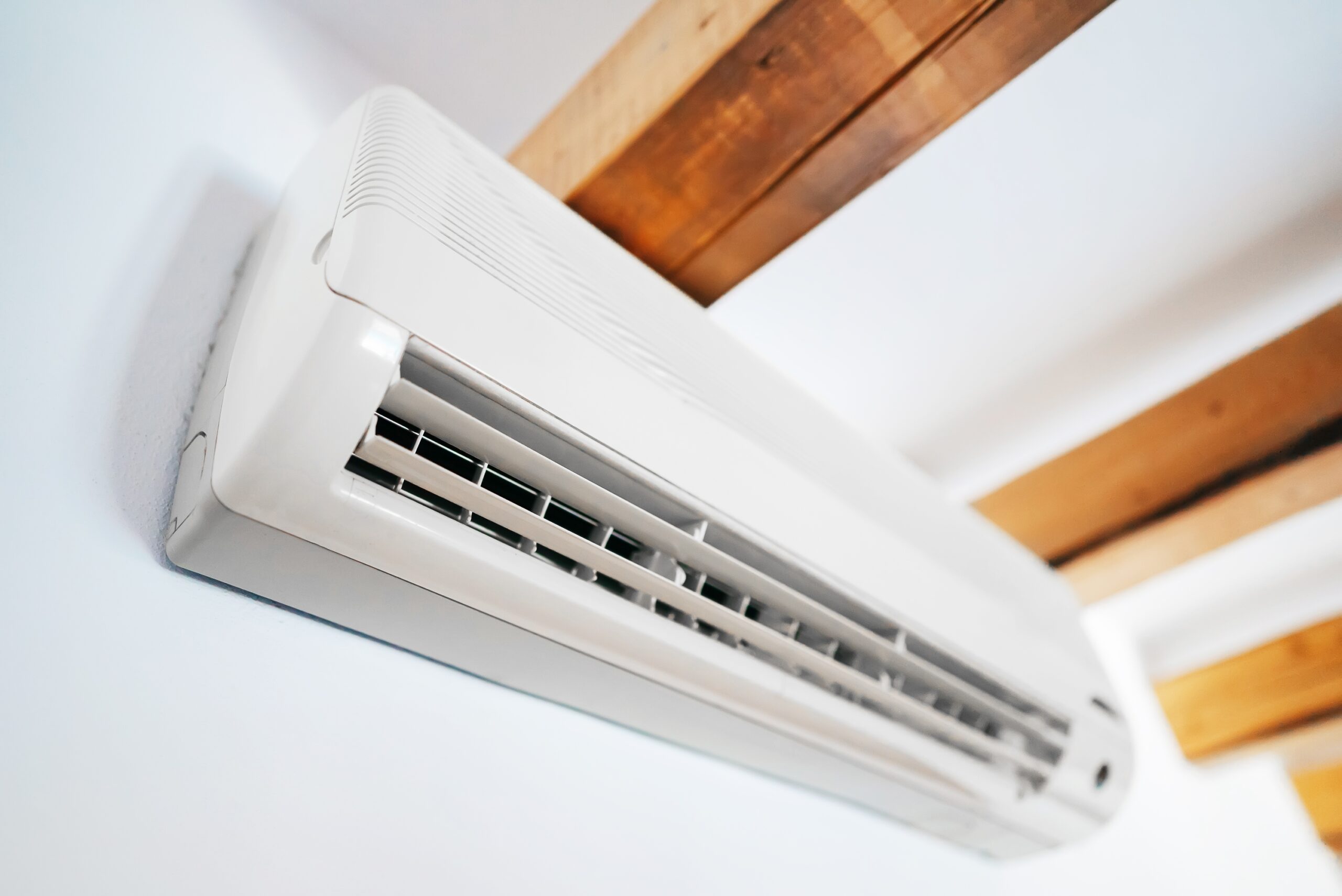 heat pump head on wall